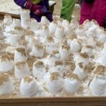 Schneeburgen, Sandburgen, Kreativität